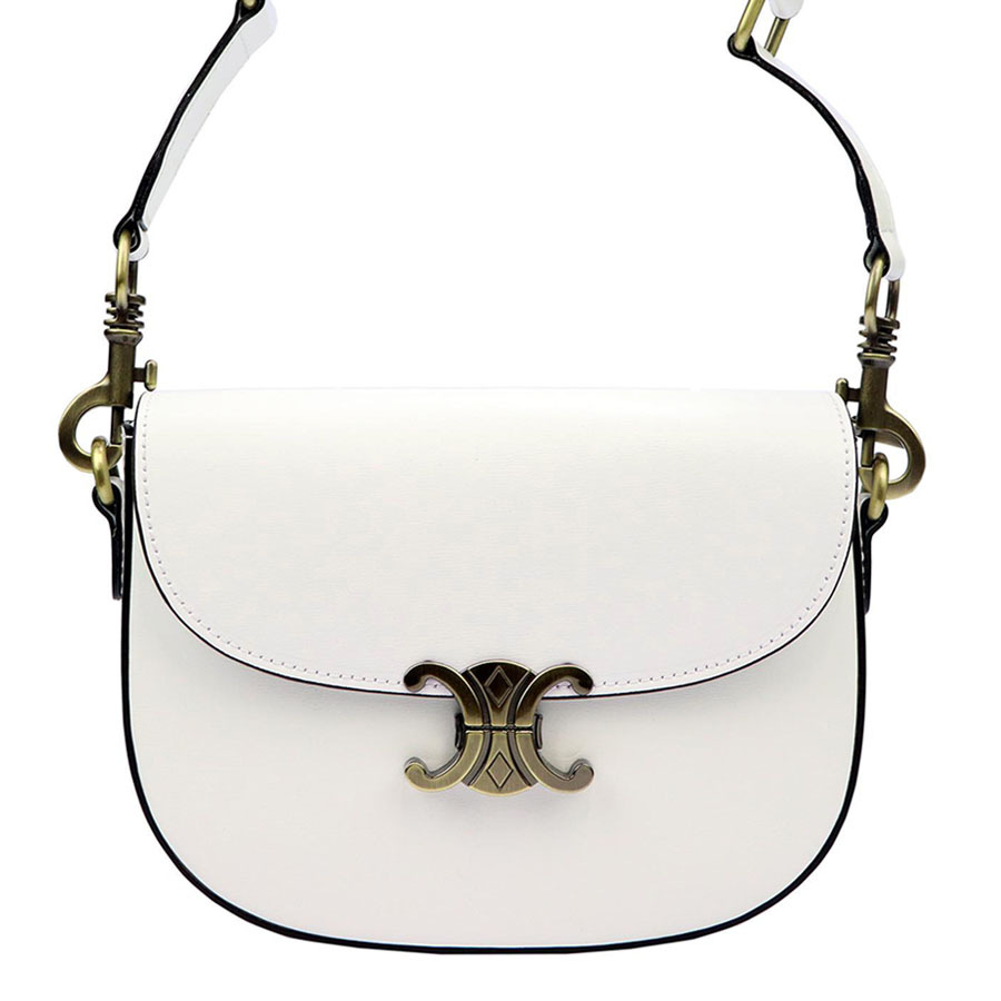 Detail produktu Biela oválna kožená crossbody kabelka s elegantným mosadzným patentom